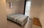 Inchiriez 2 camere, complet mobilat, utilat, parcare inclusa.