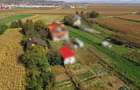 Casa de lemn + teren 2950 m2, sub 5km de centrul Tg.Mures