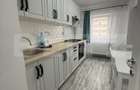 Apartament cu 2 camere, decomandat, modern, zonă centrală, etaj 3 - 5