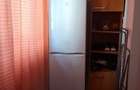 Inchiriez 2 cam baie bucatarie hol casa .gen curte