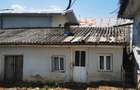 Husi, casa de vanzare cu 4 camere si teren 2000 metri