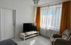 Apartament 2 camere de vânzare - Piața Romană - mobilat nou, vedere pe spate