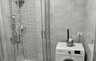 Apartament de vanzare cu terasa ?i beci, gata de utilizare