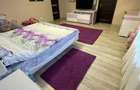 Casa spa?ioasa, complet mobilata, cu teren generos F - 12