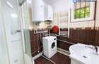 Apartament 3 camere, P-ța Romană, demisol, centrală proprie