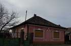 Casa de vanzare in Diosig curte generoasa + anexe 20 ari - 1