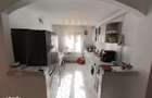 Apartament spa?ios cu 2 intrari, curte privata 81 mp utili la 50 m