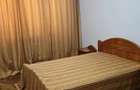 Inchiriez camere intr-un apartament de 4 camere decomandat ! Super pret !