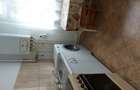 Apart 2 camere decomandate,etaj 1,centrala termica,balcon inchis,zona Profi Scoala 2 - 5