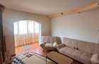 De vanzare apartament cu 3 camere si 2 balcoane,mobilat,zona centrala