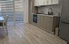 Apartament modern cu 2 camere si loc de parcare de inchiriat
