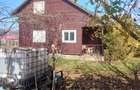 Casa de lemn + teren 2950 m2, sub 5km de centrul Tg.Mures