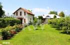 Casa noua+Casa batraneasca,Teren 7800 mp cu livada de 400 pruni, Comis