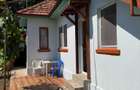 Casa 3 camere + teren 900 mp + garaj | Centrala | Canalizare | 42.000 - 2