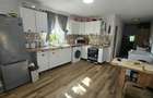 Casa cu 2 dormitoare, living si bucatarie open space, complet renovata si utilata, mobilata