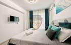 Apartament 2 camere • 2 băi • Etaj 4 • Vedere panoramică la mare & lac