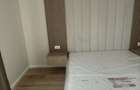 Inchiriez apartament URBANO , nou, prima inchiriere , dotat si mobilat. Apartamentul are living cu bucatarie deschisa , dormitor si baie. - 4