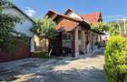 DE VANZARE: Casa la parter, cu garaj, beci si teren generos de 1200 mp - 9