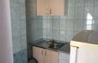 Vand apartament de 2 camere la casa,situat central- Str.Andrei Saguna - 17