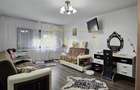 IN EXVLUSIVITATE APARTAMENT 2 CAMERE PARTER DE VANZARE IN ONESTI - 14