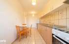 Apartament mobilat ?i utilat complet, cu curte proprie