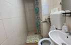 Apartament cu 2 camere, etajul 1/4, zona Podu Ros
