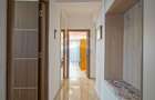 Apartament cu 4 camere decomandat în Tractorul - 22