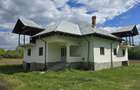 Casa pe fundatie de piatra cu garaj si teren generos in Novaci, Gorj. - 2