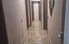 Apartament cu 4 camere decomandat în Tractorul - 4
