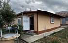 Casa-Gospodarie-locuibila cu 3 cam+ 2 anexe +1700mp teren in sat Manastireni la 15km de BT!