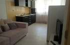 Apartament 2 camere, bucatarie open space, camera, dressing, baie. Modern si utilat
