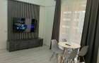 Apartament cu 2 camere decomandat în Popești-Leordeni - 1