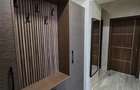 Apartament cu 4 camere decomandat în Tractorul - 4
