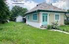 Proprietate com.Bodesti, casa+ anexe + teren 7122 mp - 1