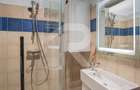 Apartament cu 3 camere semidecomandat în Central - 12