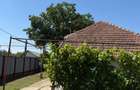 Casa 3 camere + teren 900 mp + garaj | Centrala | Canalizare | 42.000 - 2