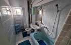 Apartament cu 3 camere decomandat în Podu Roș - 5