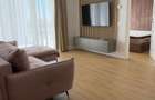 Inchiriez apartament 2 camere complet utilat, suprafata utila 52mp + balcon 7mp + loc de parcare - 2