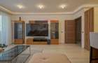 Apartament cu 4 camere decomandat în Tractorul - 2
