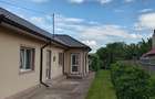Casă cu 5 camere cu Teren 600 Mp în Gugești - 1