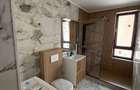 Apartament 2 dormitoare, bucatarie + living - 75 mp, parter - BRADET - 10