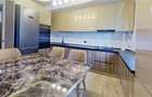 Apartament cu 4 camere decomandat în Tractorul - 2