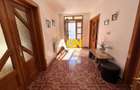 Casa de vanzare pretabila 2 familii, garaj, livada, comuna Pianu
