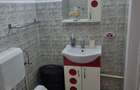 apartament central cu o camera bucatarie si baie dau in chirie
