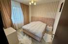 Vand apartament cu 3 camere complet mobilat si utilat.