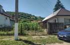 Casa de vanzare impreuna cu 2 terenuri intravilan , formand un tot unitar - 1