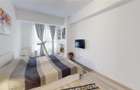 Apartament cu 4 camere decomandat în Tractorul - 14