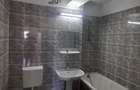 De vanzare apartament decomandat 2 camere cu garaj - 2