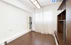 Apartament 3 camere, P-ța Romană, demisol, centrală proprie