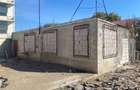 Vand constructie la rosu . 750 mp teren intravilan